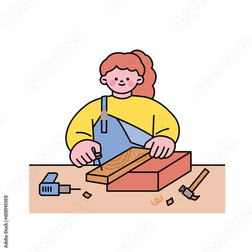 One day class workshop. People are learning new skills. wood workshop.