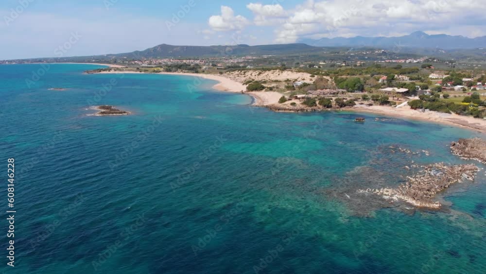 Aerial beautiful beach and water bay in the greek spectacular coast line. Turquoise blue transparent water, unique rocky cliffs, Greece summer top travel destination Peloponnese Aerial beautiful beach and water bay in the greek spectacular coast line. Turquoise blue transparent water, unique rocky cliffs, Greece summer top travel destination Peloponnese