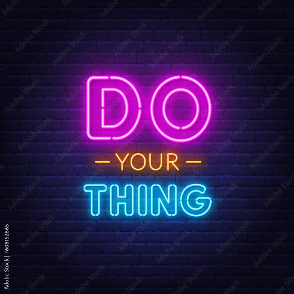 Do Your Things neon lettering on brick wall background.