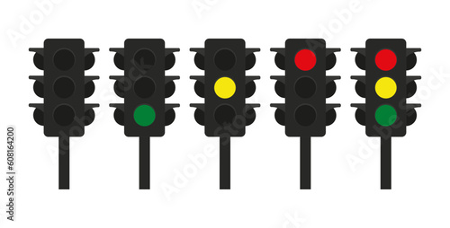 Traffic signal or traffic light controlling the flow of vehicles with red, yellow, and green lights. Traffic signal, traffic light, signalization, intersection, road safety.