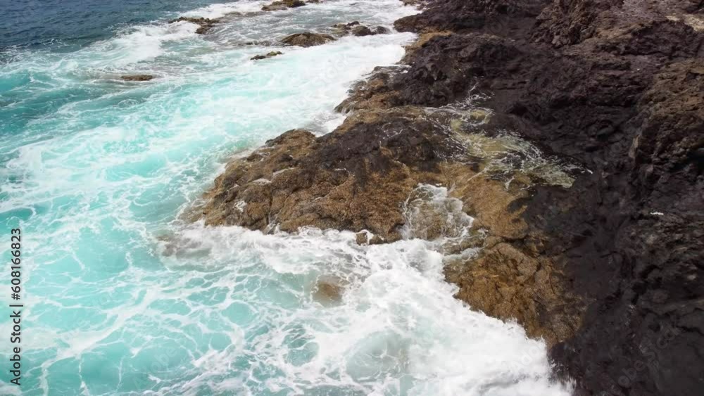 4k aerial of waves crashing against cliff rocky coastline in Tenerife 4k aerial of waves crashing against cliff rocky coastline in Tenerife