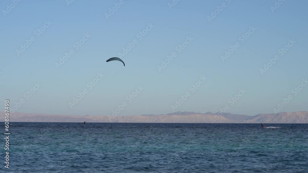 Man Kite Surfing In The Red Sea With Strong Wind In Dahab, Egypt - wide Man Kite Surfing In The Red Sea With Strong Wind In Dahab, Egypt - wide
