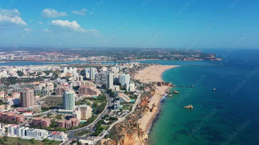 Tourist Portuguese city of Portimao aerial view on a sunny day. South Portugal Algarve. view of river arade. Tourist Portuguese city of Portimao aerial view on a sunny day. South Portugal Algarve. view of river arade.