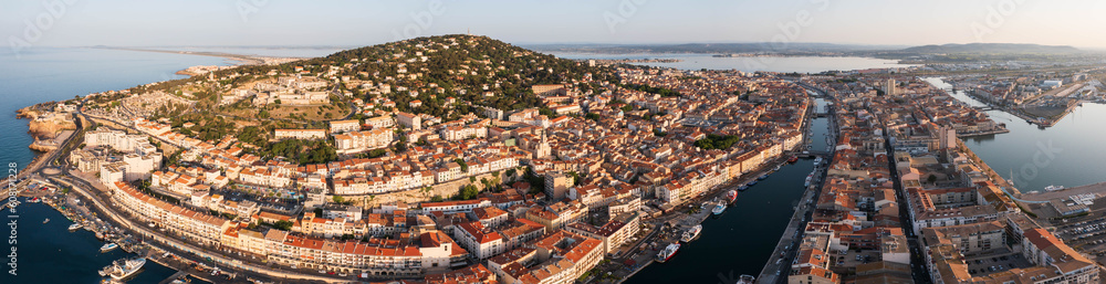 Aerial panoramic of the city of Sete at sunrise, in Occitanie, France