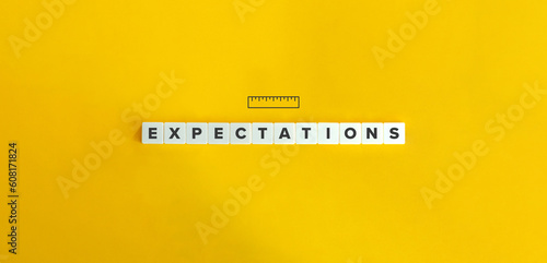 Letter Tiles on Yellow Background. Minimal Aesthetics.