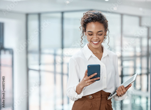 Business, woman and reading on mobile phone with tablet at the office with a smile for online communication. Female professional, technology and typing at a company for conversation on the internet.