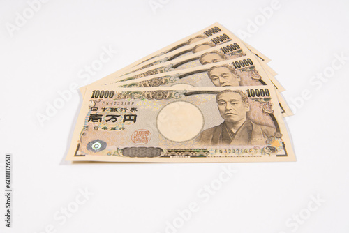 並べられた一万円札 photo
