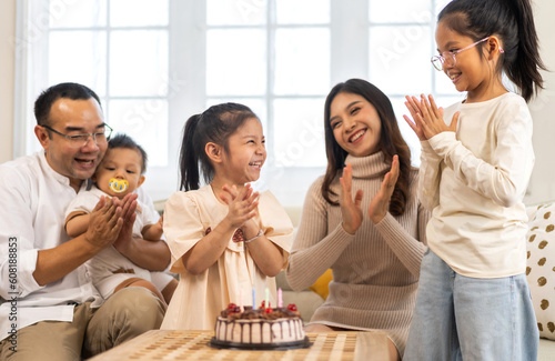 Wallpaper Mural Portrait of happy love asian big family father and mother with asian baby and little girl happy birthday, party, celebration, cake, surprise, asian family smiling together.Family party Torontodigital.ca