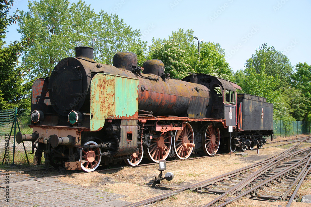 Obraz premium an old, rusty train at the station