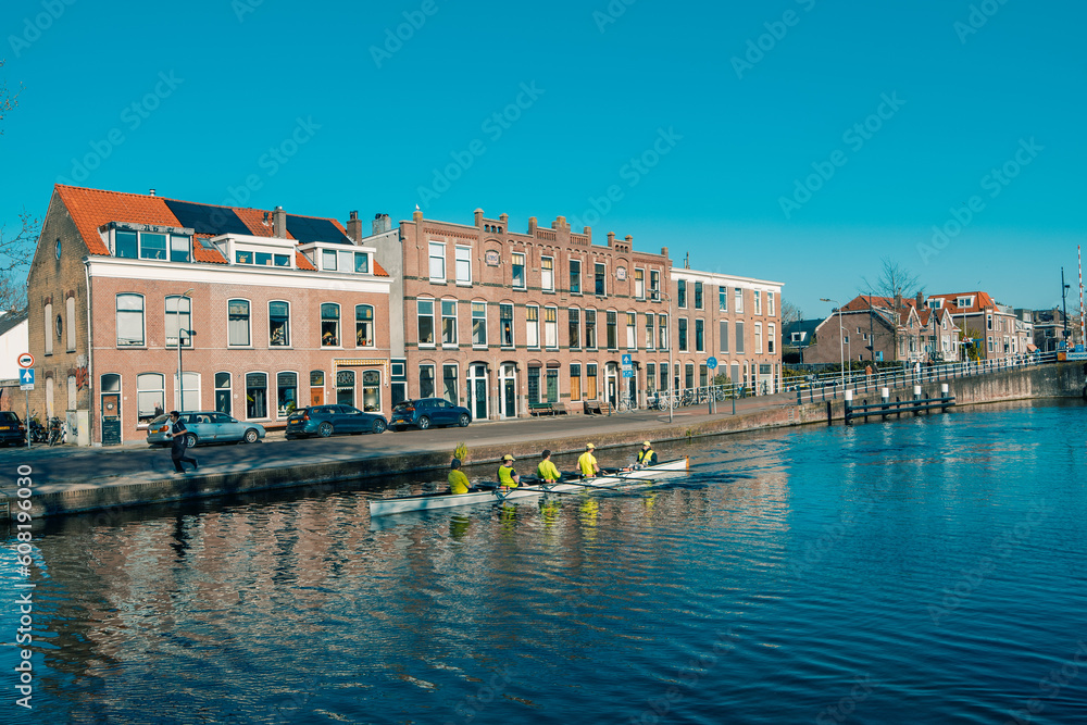Canals and Brick Houses, Canoe Floats on the River in Delft, Netherlands