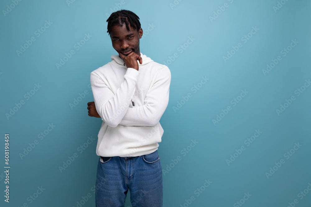 black american young man with dreadlocks thinking about strategy black american young man with dreadlocks thinking about strategy