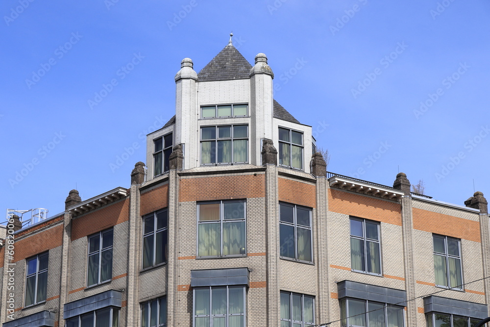 Obraz premium Amsterdam Oudezijds Voorburgwal Canal and Damstraat Street Corner Building Exterior Close Up, Netherlands