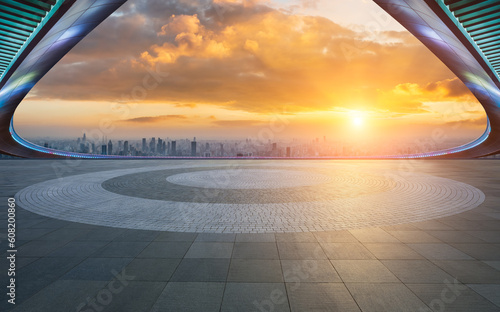 Empty square floors and bridge with the city skyline at sunset in Shanghai © ABCDstock