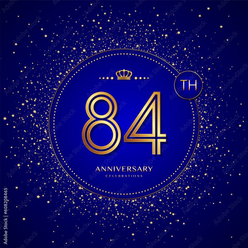 84th anniversary logo with gold numbers and glitter isolated on a blue background 84th anniversary logo with gold numbers and glitter isolated on a blue background