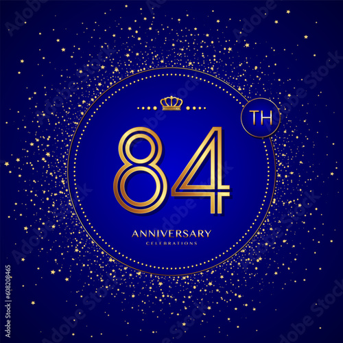 84th anniversary logo with gold numbers and glitter isolated on a blue background