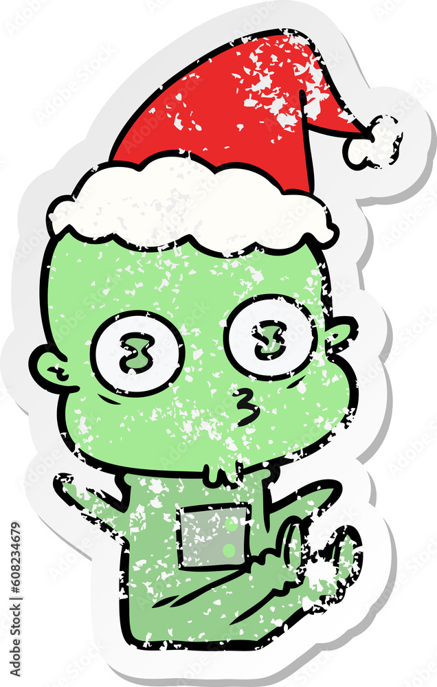 Fototapeta premium hand drawn distressed sticker cartoon of a weird bald spaceman wearing santa hat
