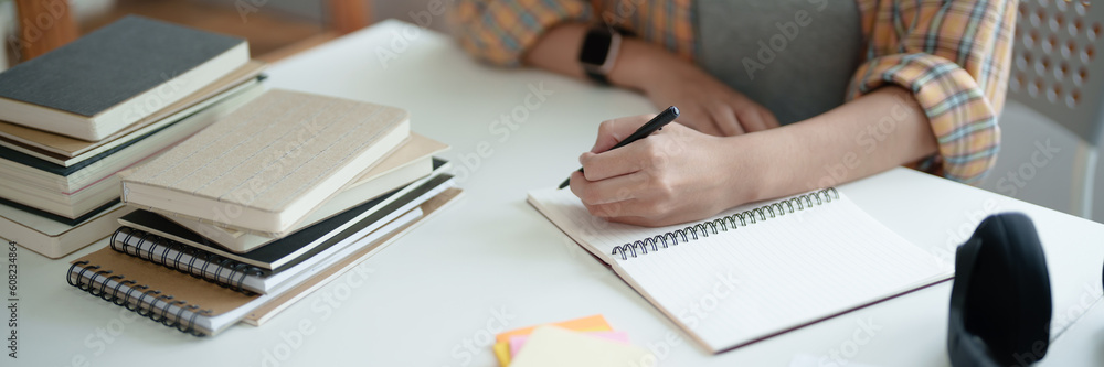 Self learning concept. Young woman student university Researching Book In Library. University Student Self learning concept. Young woman student university Researching Book In Library. University Student