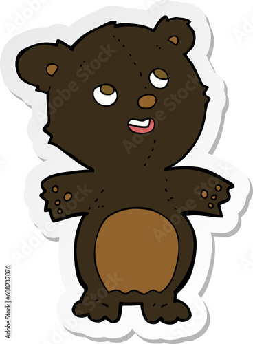 sticker of a cartoon happy little black bear