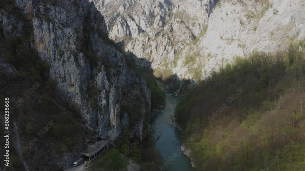Nature's Beauty Unveiled: Aerial Views of a Deep Canyon with Crystal Blue River Nature's Beauty Unveiled: Aerial Views of a Deep Canyon with Crystal Blue River