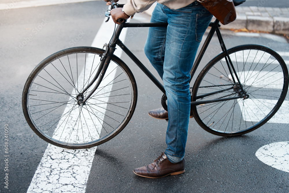 Bicycle, travel and legs of business man on street for transport, commute and journey to work. City, traffic and male person on bike for eco friendly, carbon neutral and sustainability transportation Bicycle, travel and legs of business man on street for transport, commute and journey to work. City, traffic and male person on bike for eco friendly, carbon neutral and sustainability transportation