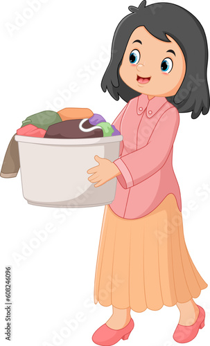 a mother holding large basket with dirty clothes