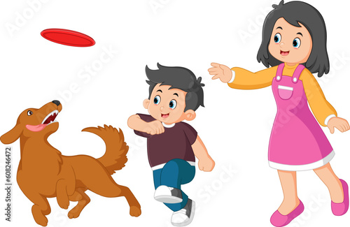 a mother is playing and throws a frisbee at a boy and is followed by her dog