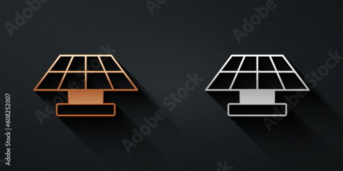 Gold and silver Solar energy panel icon isolated on black background. Long shadow style. Vector