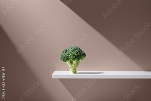 Green broccoli on white plain surface photo
