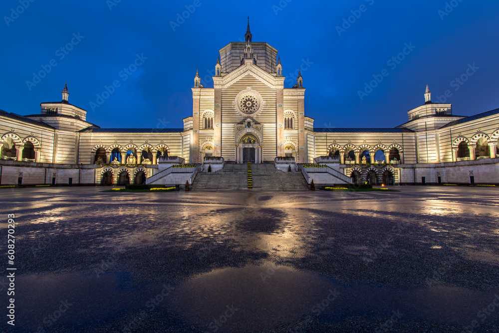 Monumental cemetery in Milan, Italy at night in the rain