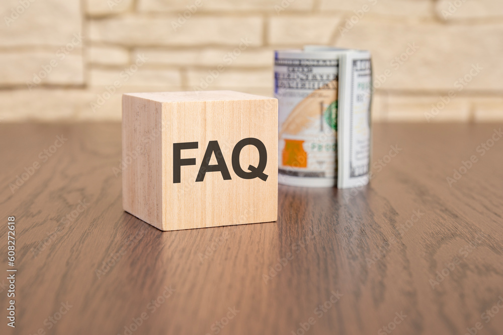 wooden block with text FAQ on dark background - frequently asked question concept wooden block with text FAQ on dark background - frequently asked question concept