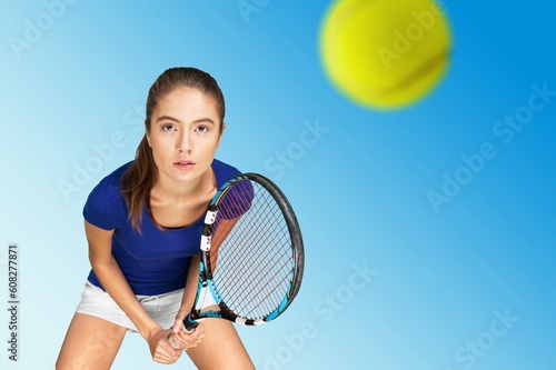 Portrait of sporty person playing tennis © BillionPhotos.com