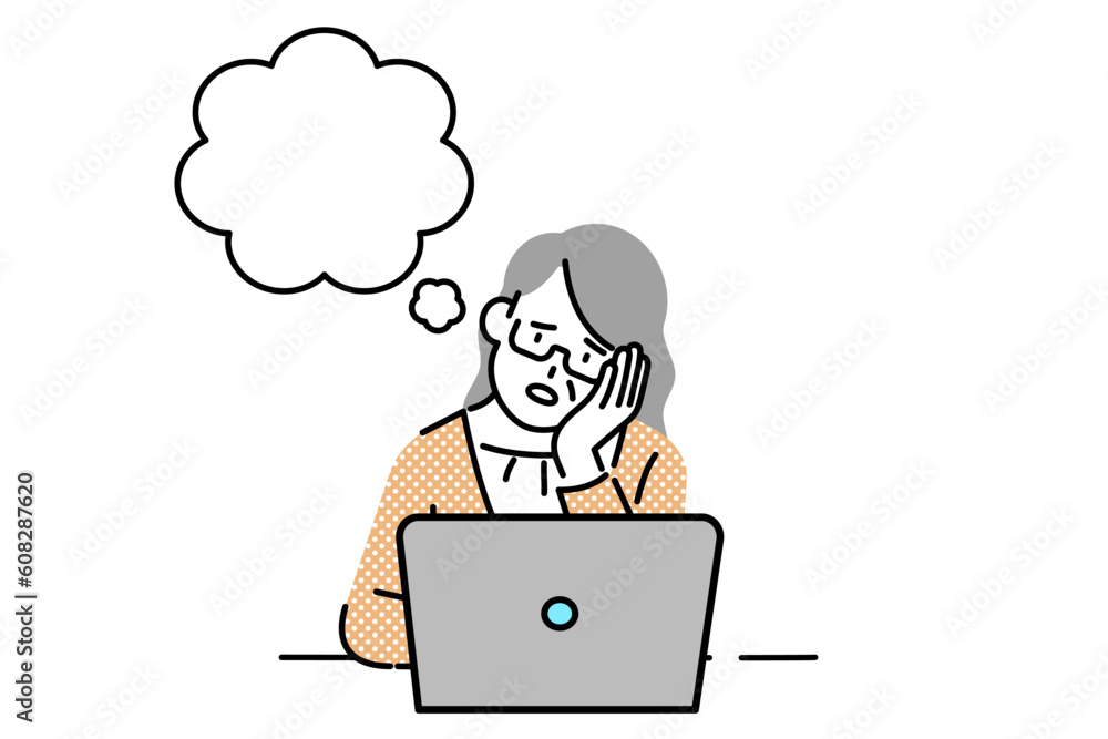 A senior executive sits at his laptop, thinking. A senior executive sits at his laptop, thinking.