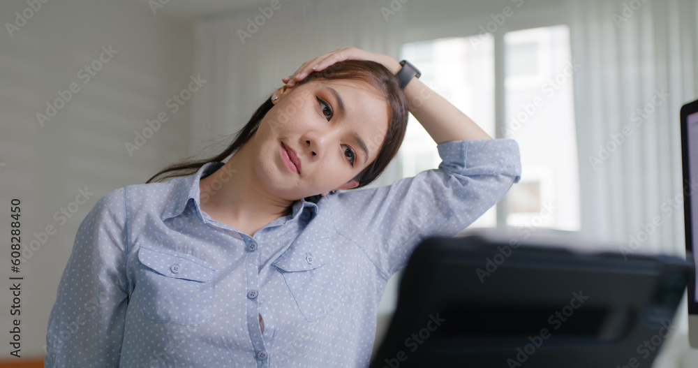 Asia people young woman worker work at home job video call telemedicine online clinic app for workforce care meet chat or tele consult to doctor remote advice teach to relax stiff neck or wrist pain. Asia people young woman worker work at home job video call telemedicine online clinic app for workforce care meet chat or tele consult to doctor remote advice teach to relax stiff neck or wrist pain.