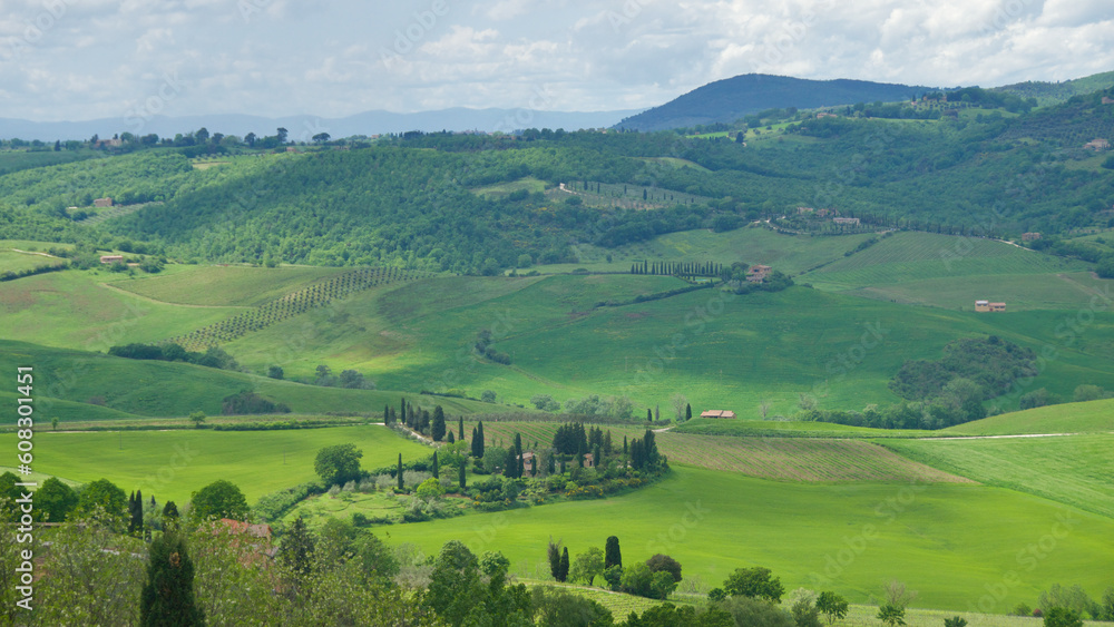 Beautiful scenic landscape with trees and mountains in Tuscany, Italy