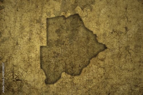 map of botswana on a old vintage crack paper background .