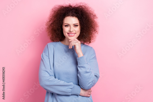 Photo of confident smart woman dressed blue sweatshirt smiling arm chin isolated pink color background