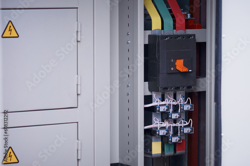Panels of electrical switches in the open air for inspection at the exhibition. Open cabinet with access to circuit breakers. Power installations of the distribution network of power supply