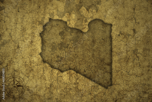 map of libya on a old vintage crack paper background .