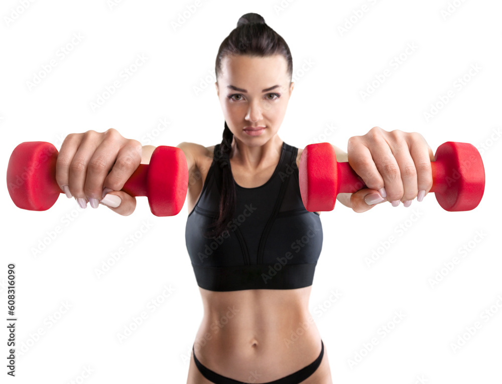 Sporty young woman training with dumbbells, pumping up muscles of hands Sporty young woman training with dumbbells, pumping up muscles of hands