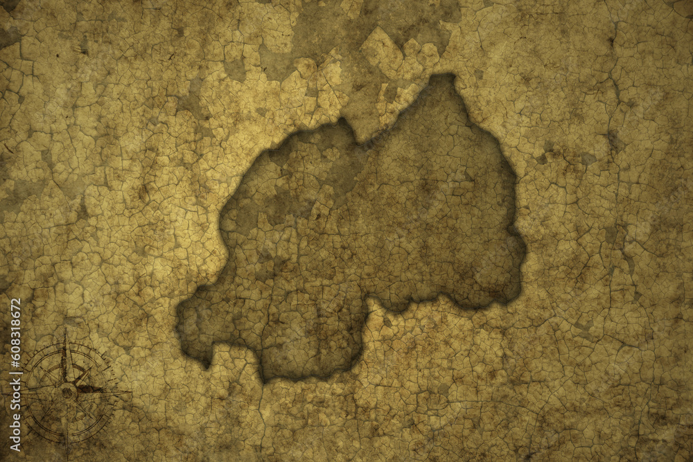 map of rwanda on a old vintage crack paper background .