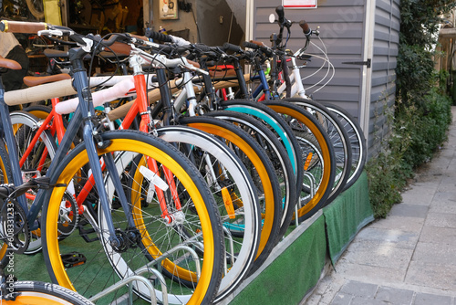 Modern bright new bicycles close-up. Rent and sale of bikes.