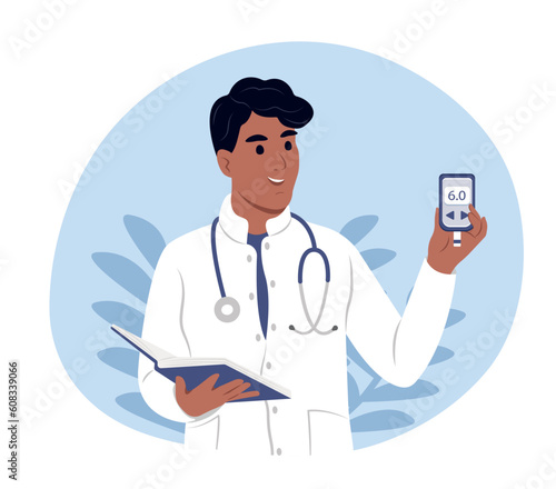 A young smiling black doctor holds a glucometer in his hands for measuring sugar. World Diabetes Day.