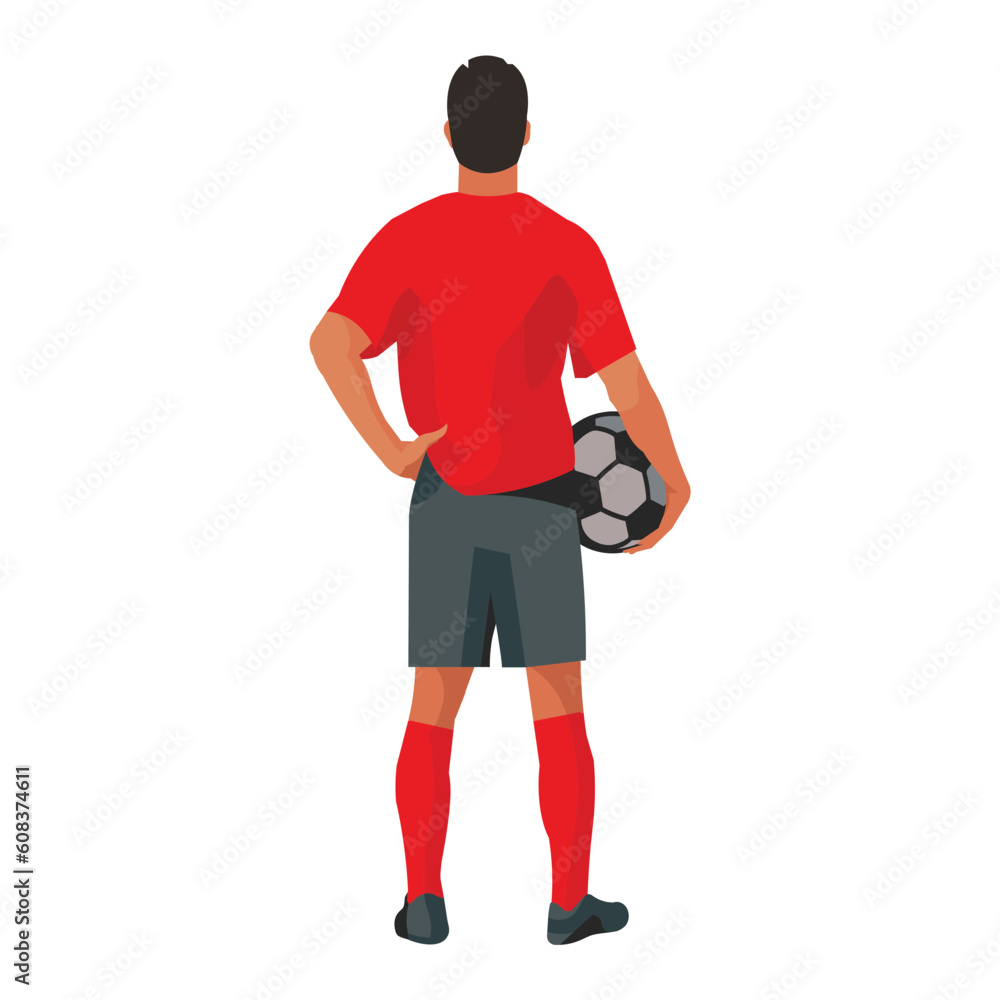 Asian football player stands and holds a ball in his hand Asian football player stands and holds a ball in his hand