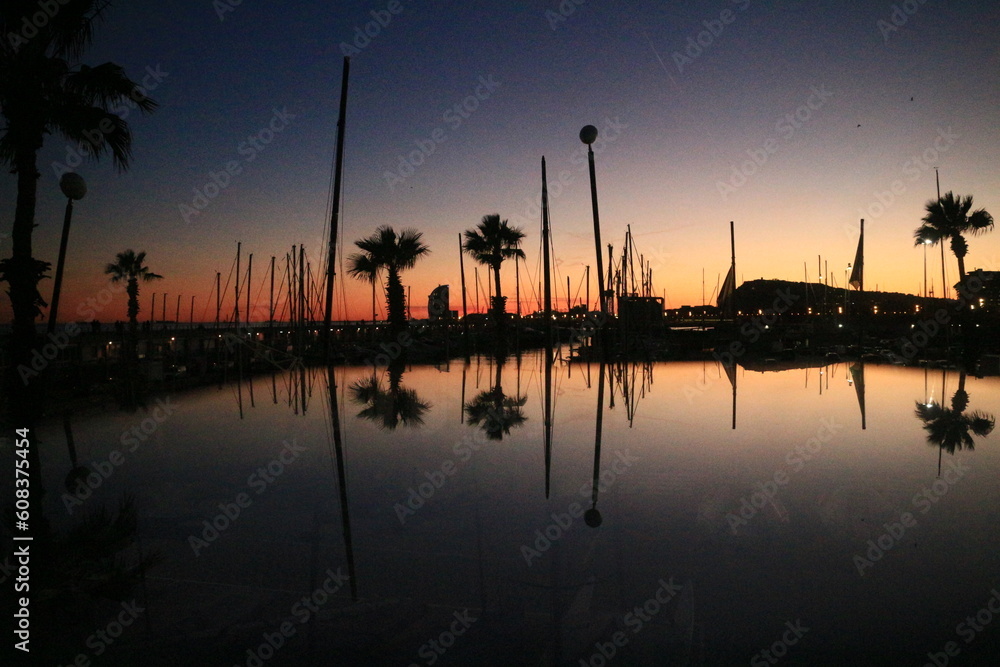 Yacht port at sunset