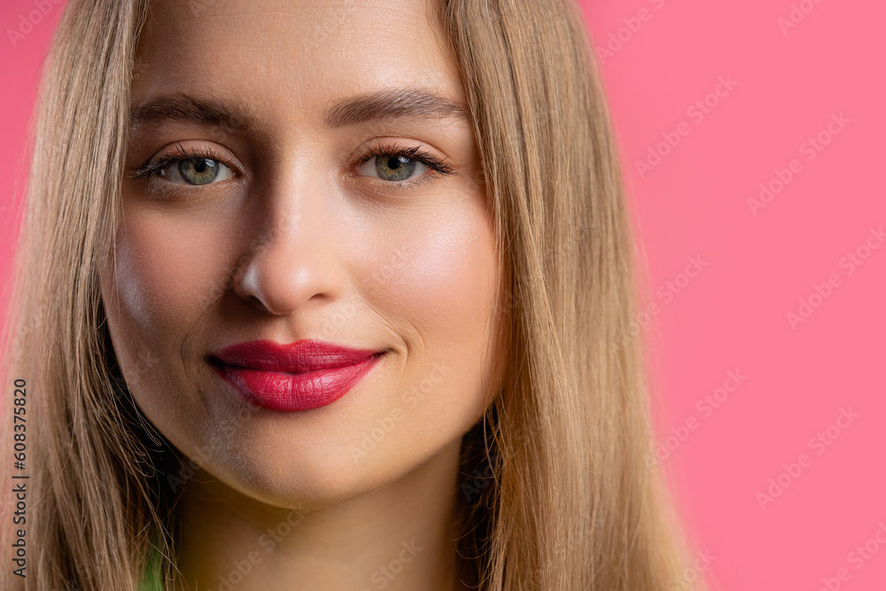Pretty blonde woman, big lips on pink background. Smiling natural healthy girl Pretty blonde woman, big lips on pink background. Smiling natural healthy girl