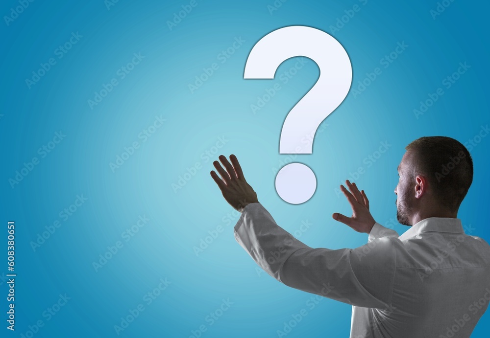 Hand of doctor holding a big question mark Hand of doctor holding a big question mark