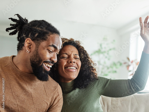 woman couple man happy happiness  love black young lifestyle together romantic boyfriend girlfriend music listening sound tablet earphones headphones entertainment