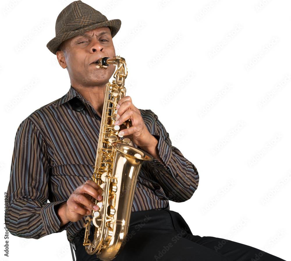 Naklejka premium Saxophonist. Man playing on the gold saxophone