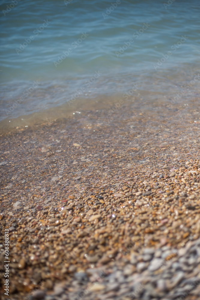 sand and sea and stones sand and sea and stones