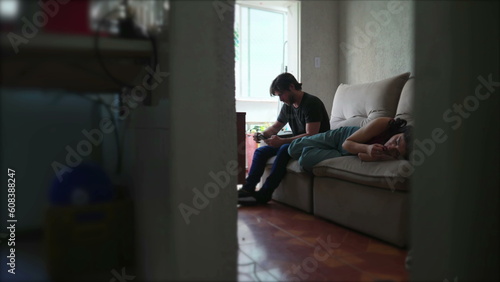 Fotografie Lonely couple feeling alone at home apartment